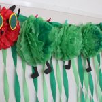 Very Hungry Caterpillar tissue paper decoration using tissue paper pom poms